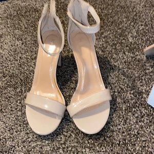 Nude open toe shoe
